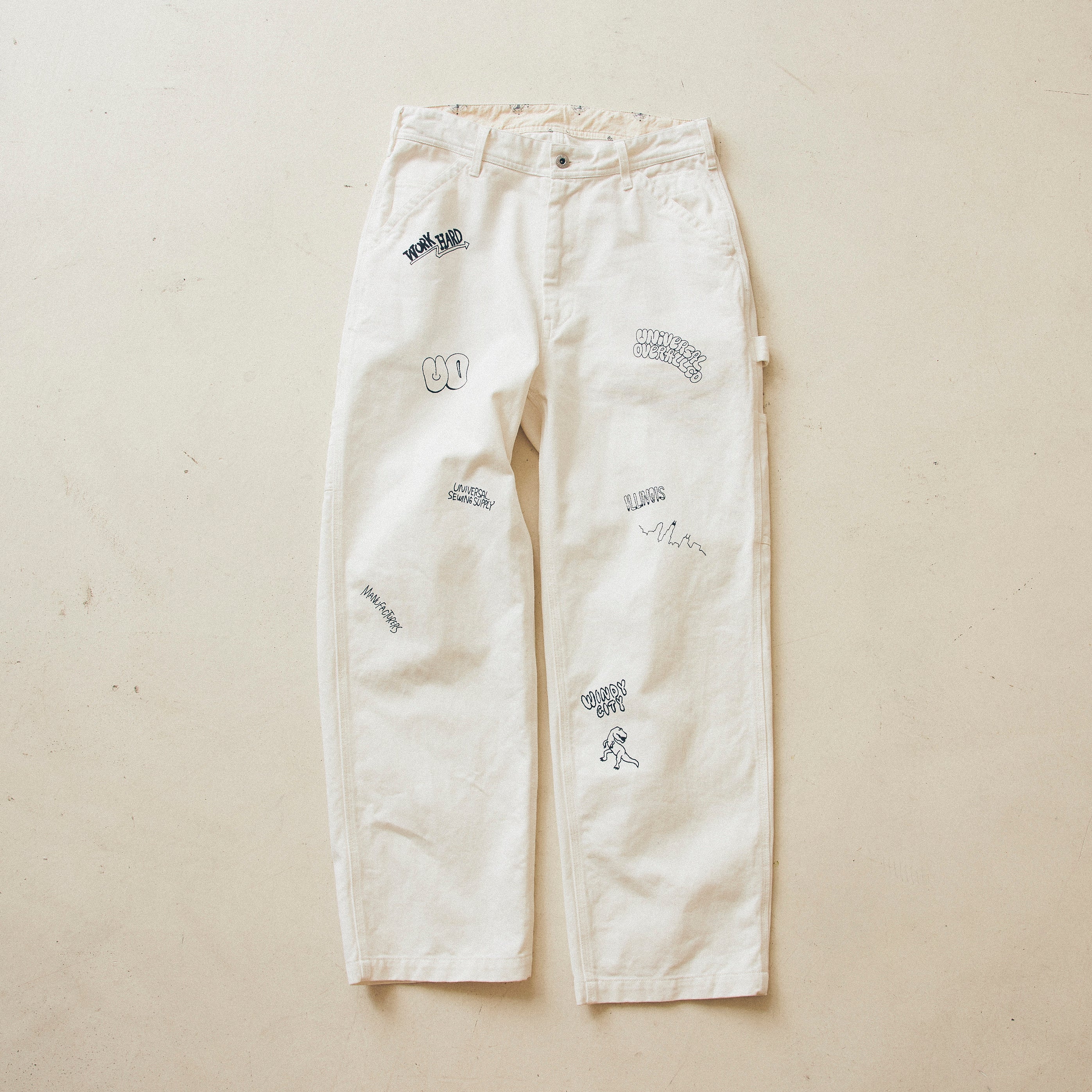 GRAFFITI LOGO PANTS【U2433601-100TH】